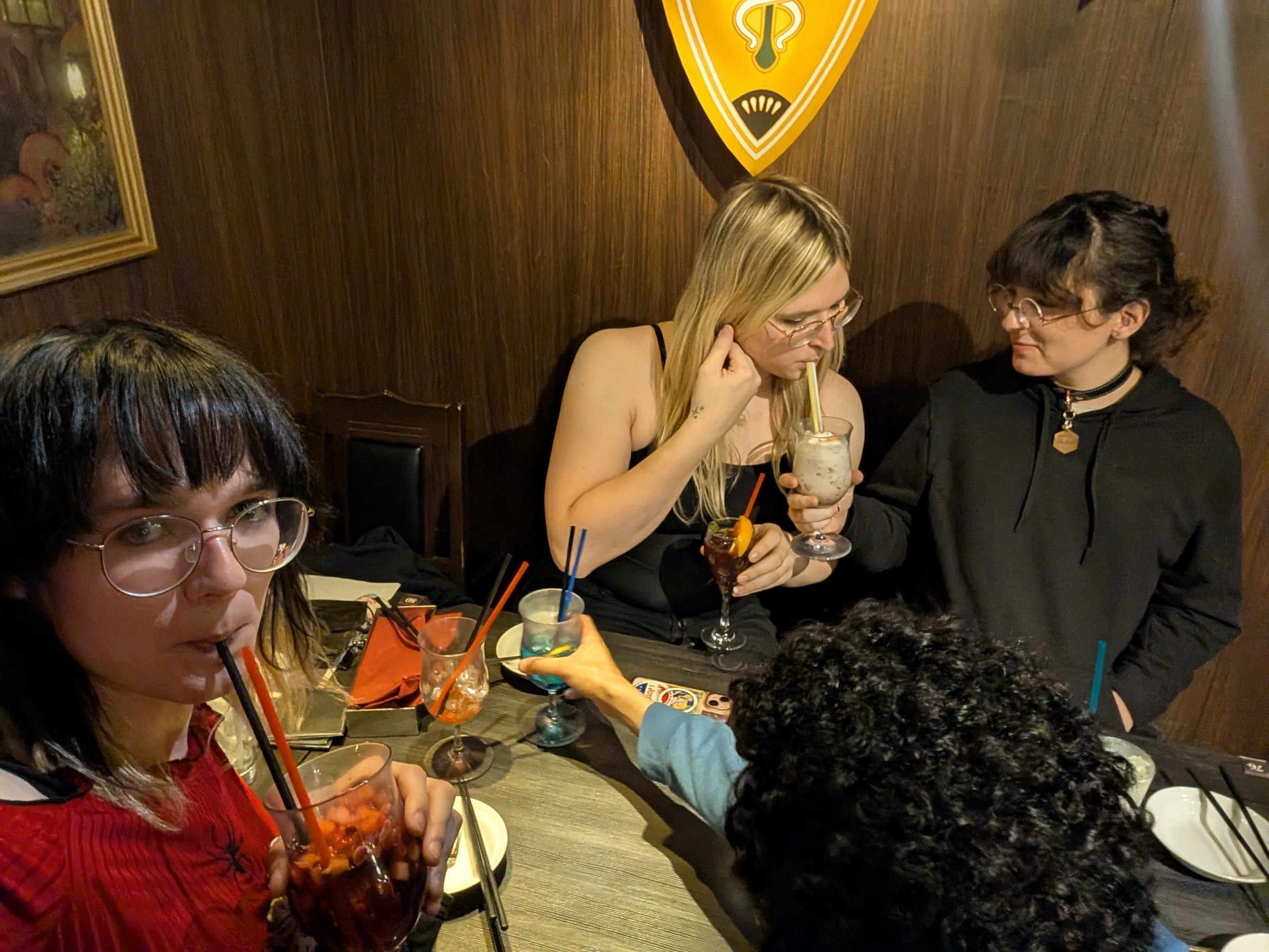 Selfie of Val with candids of the table