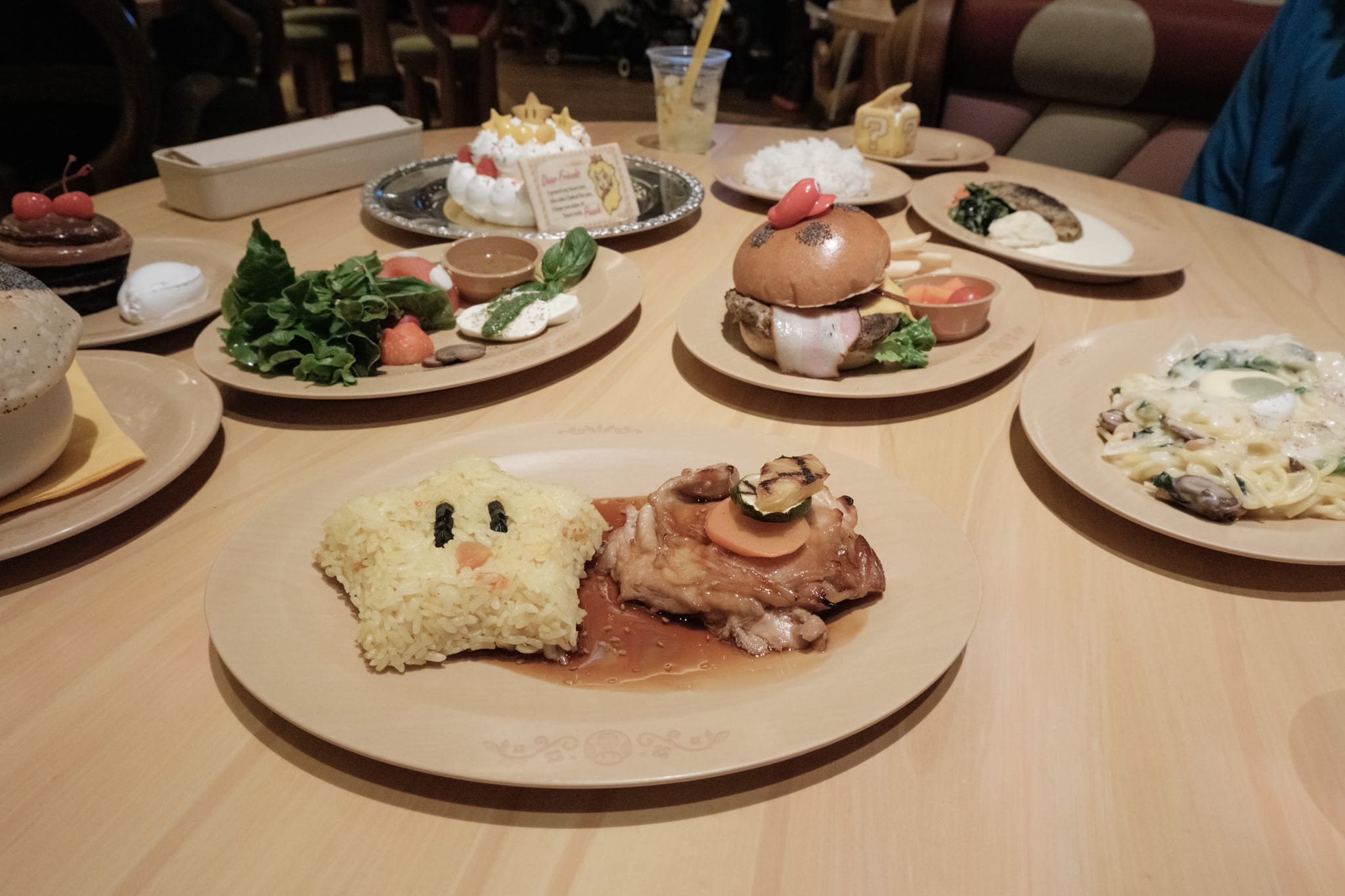 All of the mario themed plates of food on the table
